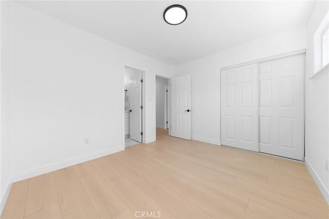 14537 Rath St, La Puente, CA 91744 - unfurnished bedroom featuring light wood-style floors and a closet