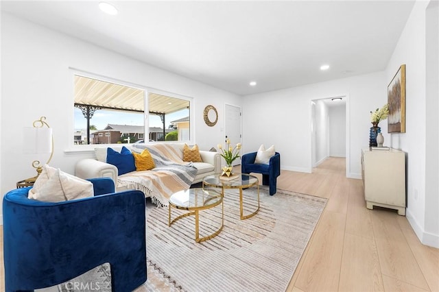 14537 Rath St, La Puente, CA 91744 - living area featuring light wood-style flooring and recessed lighting