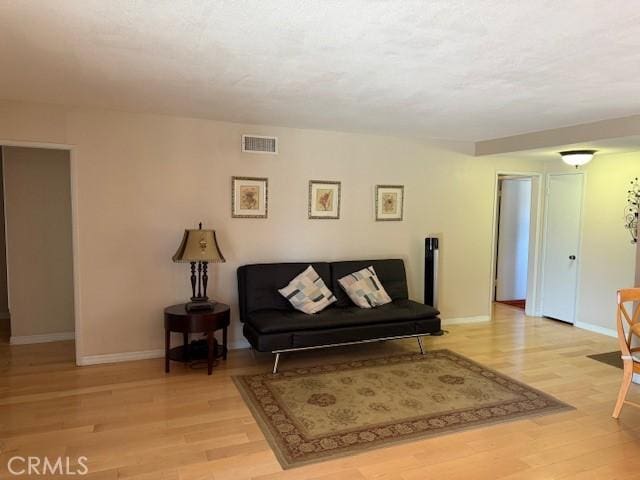 1640 Valencia Ave, Placentia, CA 92870 - living room featuring baseboards and light wood-style floors