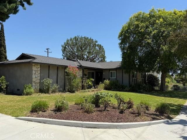 1640 Valencia Ave, Placentia, CA 92870 - ranch-style house featuring a front yard, stone siding, and stucco siding