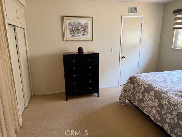 1640 Valencia Ave, Placentia, CA 92870 - bedroom with light carpet and a closet