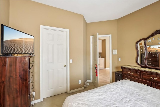 26942 Willow Tree Ln, Laguna Hills, CA 92653 - bedroom featuring baseboards and light colored carpet