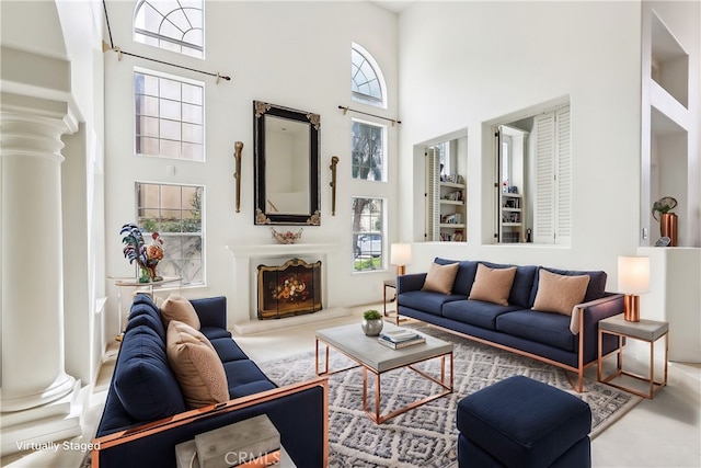 26942 Willow Tree Ln, Laguna Hills, CA 92653 - living area with a towering ceiling and decorative columns