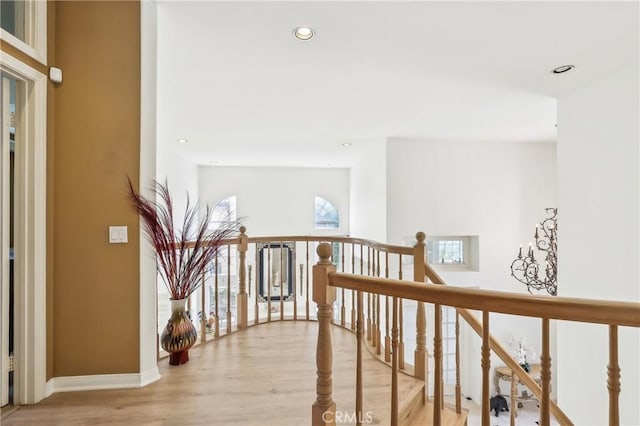 26942 Willow Tree Ln, Laguna Hills, CA 92653 - corridor with light wood-type flooring, an upstairs landing, and recessed lighting