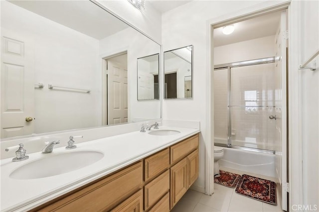 26942 Willow Tree Ln, Laguna Hills, CA 92653 - bathroom featuring tile patterned floors, double vanity, and shower / bath combination with glass door