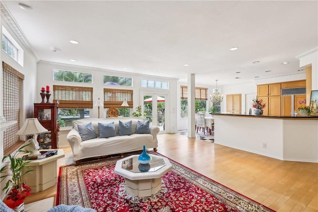 26942 Willow Tree Ln, Laguna Hills, CA 92653 - living room featuring light wood-style flooring, recessed lighting, and crown molding