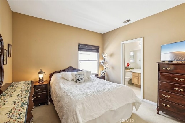 26942 Willow Tree Ln, Laguna Hills, CA 92653 - bedroom featuring light colored carpet and ensuite bath