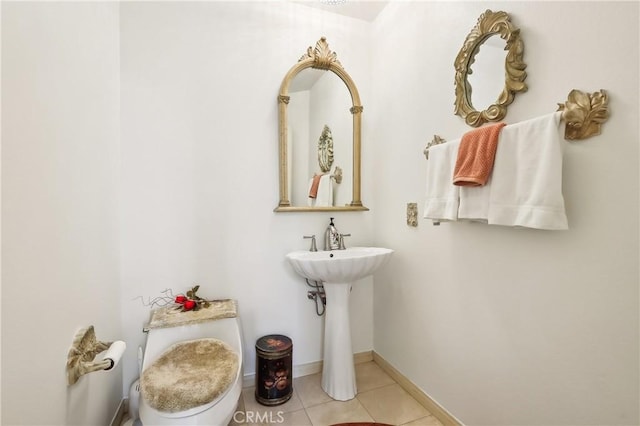 26942 Willow Tree Ln, Laguna Hills, CA 92653 - half bathroom featuring tile patterned floors and toilet