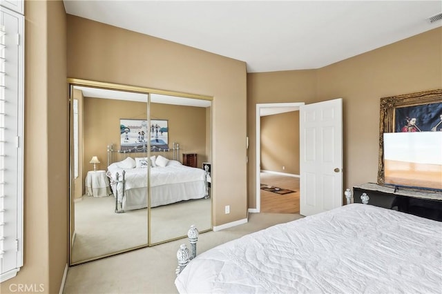 26942 Willow Tree Ln, Laguna Hills, CA 92653 - carpeted bedroom featuring a closet and baseboards