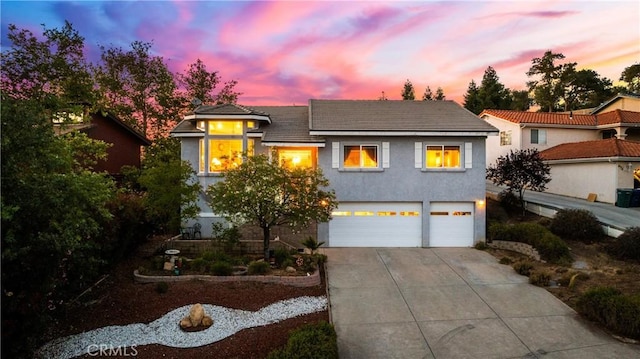 4766 Egret Ln, Paso Robles, CA 93446 - view of front property with driveway, a garage, stucco siding, and a tile roof