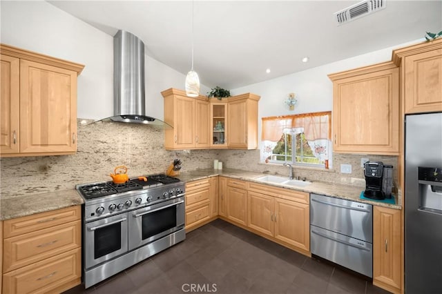 4766 Egret Ln, Paso Robles, CA 93446 - kitchen with stainless steel appliances, wall chimney exhaust hood, light brown cabinetry, and vaulted ceiling