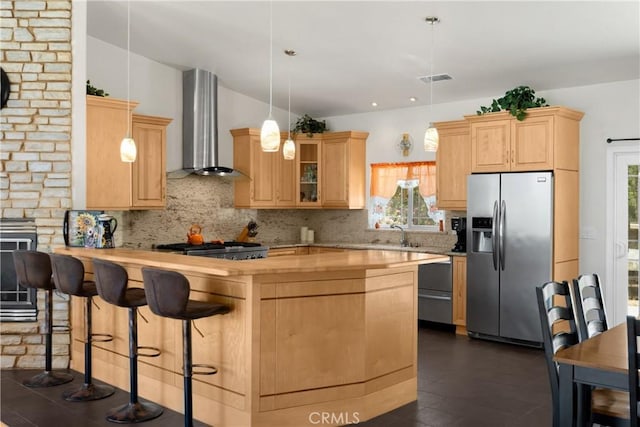 4766 Egret Ln, Paso Robles, CA 93446 - kitchen featuring appliances with stainless steel finishes, wall chimney range hood, wood counters, decorative backsplash, and light brown cabinetry
