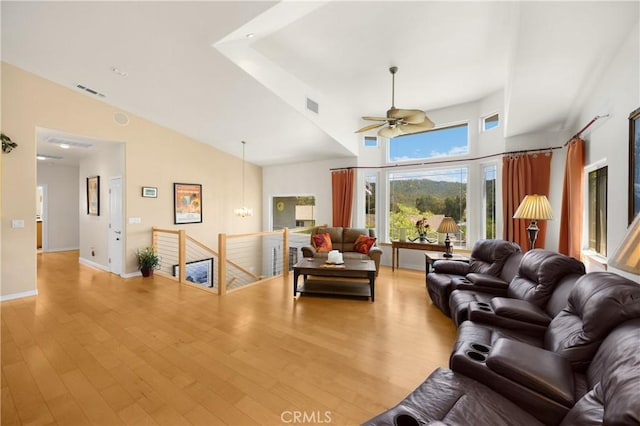 4766 Egret Ln, Paso Robles, CA 93446 - living area featuring ceiling fan, wood finished floors, and a towering ceiling
