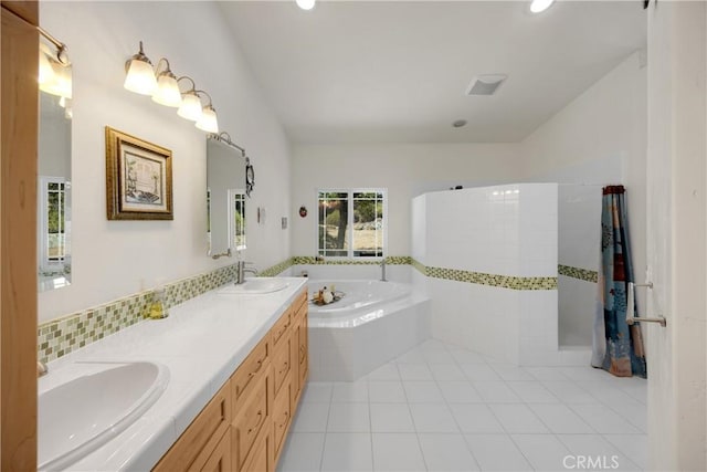 4766 Egret Ln, Paso Robles, CA 93446 - full bath featuring a garden tub, double vanity, tile patterned floors, a tile shower, and recessed lighting