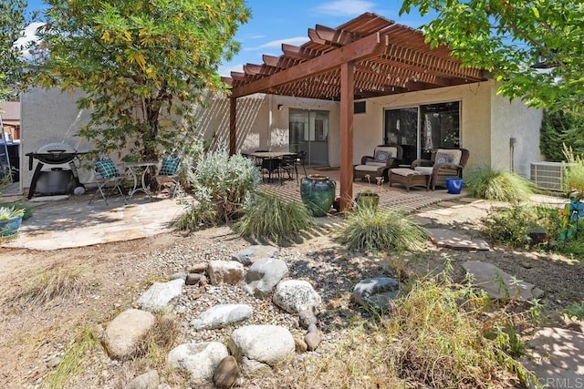 5550 La Cuenta Dr, San Diego, CA 92124 - back of property with outdoor lounge area, stucco siding, a pergola, and a patio area