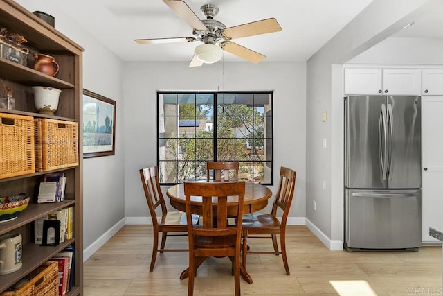 5550 La Cuenta Dr, San Diego, CA 92124 - dining room with light wood finished floors and a ceiling fan