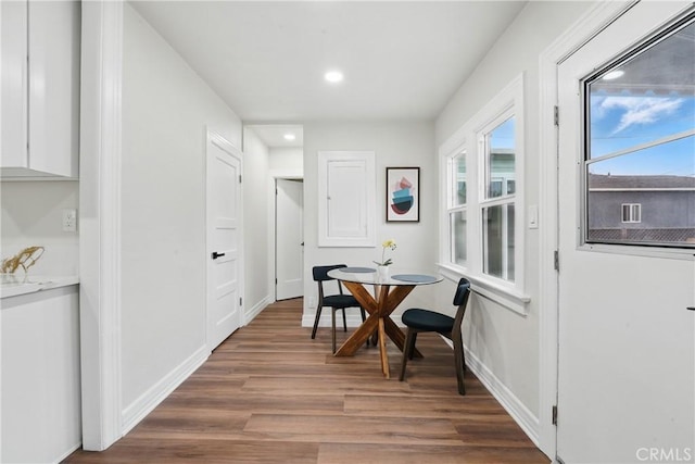 8680 Evergreen Ave, South Gate, CA 90280 - dining space with wood finished floors and recessed lighting