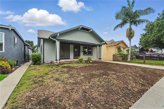 8680 Evergreen Ave, South Gate, CA 90280 - ranch-style house featuring covered porch