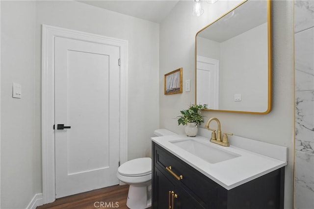 8680 Evergreen Ave, South Gate, CA 90280 - bathroom featuring vanity and wood finished floors