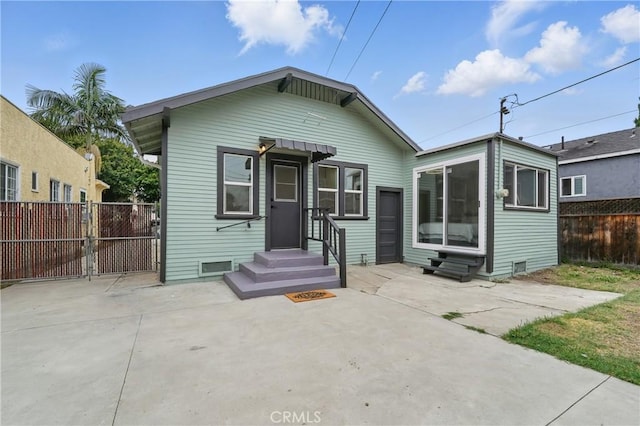 8680 Evergreen Ave, South Gate, CA 90280 - back of property with entry steps and a gate