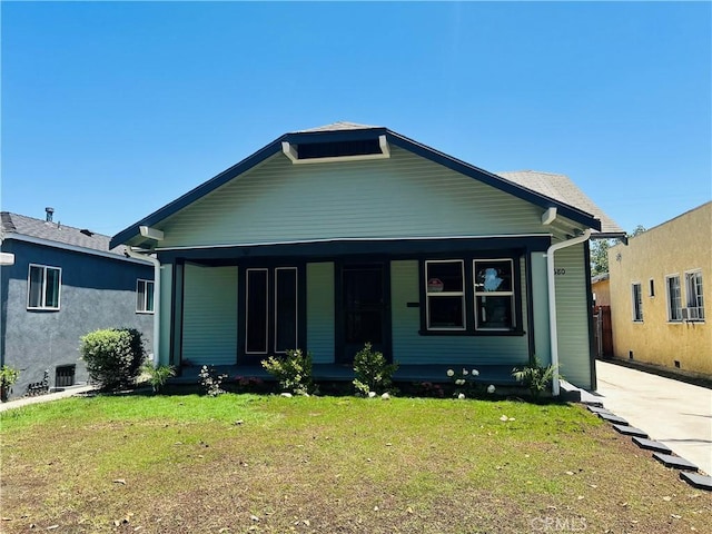8680 Evergreen Ave, South Gate, CA 90280 - bungalow with a porch and a front lawn