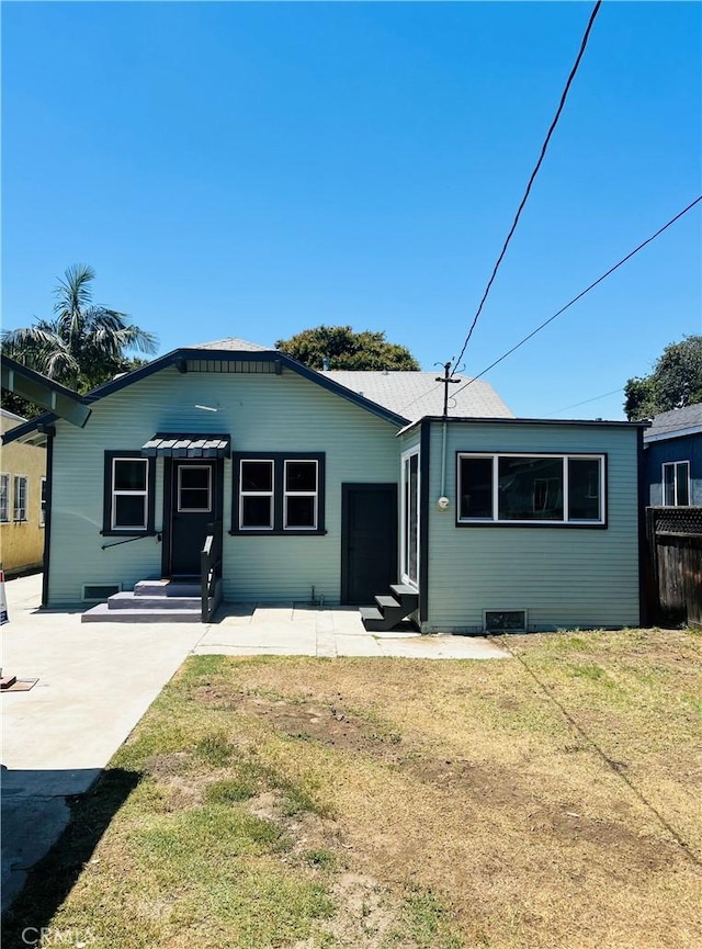 8680 Evergreen Ave, South Gate, CA 90280 - view of front of home with entry steps and a front yard