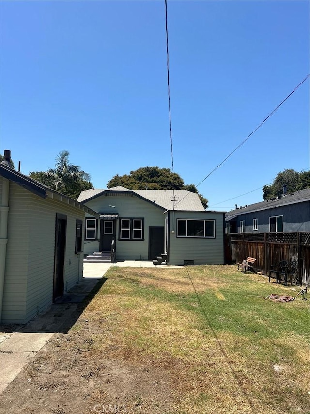 8680 Evergreen Ave, South Gate, CA 90280 - rear view of property with entry steps