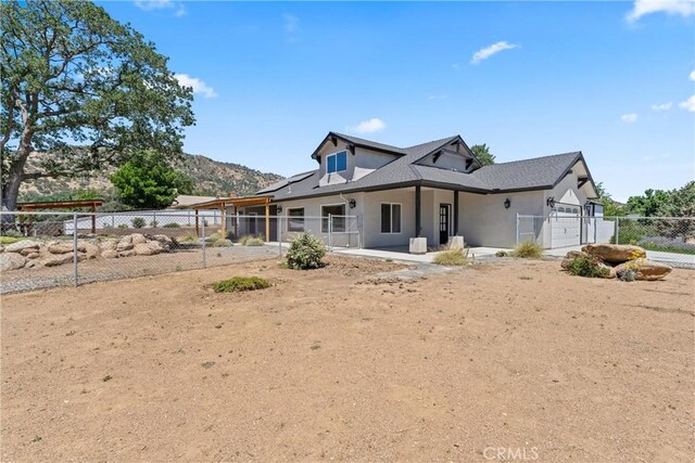21813 Valley Vista Dr, Tehachapi, CA 93561 - view of front of property featuring stucco siding and a garage