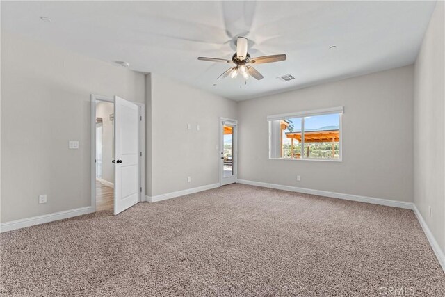 21813 Valley Vista Dr, Tehachapi, CA 93561 - unfurnished bedroom featuring light carpet and a ceiling fan
