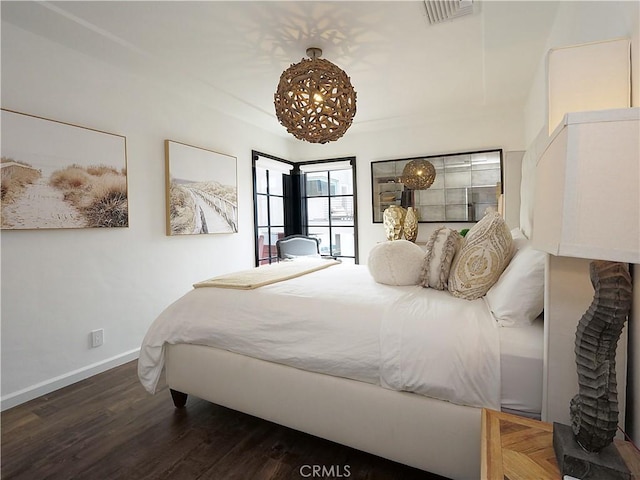 229 Marine Pl, Manhattan Beach, CA 90266 - bedroom featuring wood finished floors and a chandelier