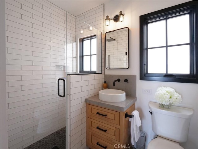 229 Marine Pl, Manhattan Beach, CA 90266 - bathroom with a shower stall, vanity, and backsplash