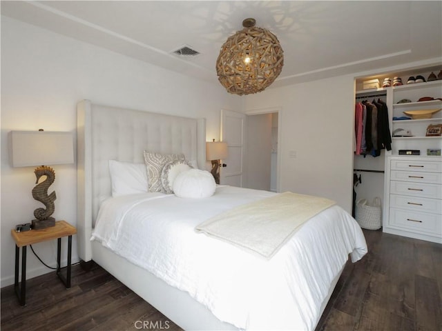 229 Marine Pl, Manhattan Beach, CA 90266 - bedroom with dark wood-style flooring, a closet, and a chandelier