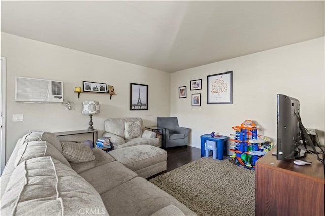 418 E Harvard Rd Unit D, Burbank, CA 91501 - living area featuring an AC wall unit and wood finished floors