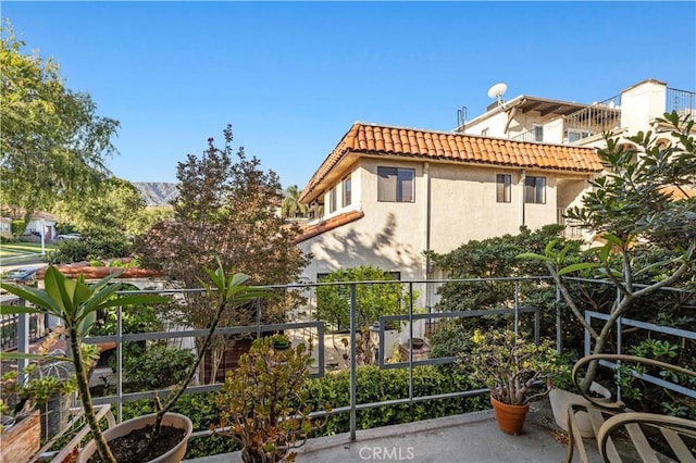 418 E Harvard Rd Unit D, Burbank, CA 91501 - view of home's exterior featuring stucco siding and a tile roof