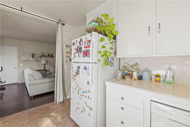 418 E Harvard Rd Unit D, Burbank, CA 91501 - kitchen featuring white appliances, white cabinets, tasteful backsplash, an AC wall unit, and light stone countertops