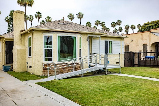 4519 9th Ave, Los Angeles, CA 90043 - view of front facade featuring stucco siding, a shingled roof, and a chimney