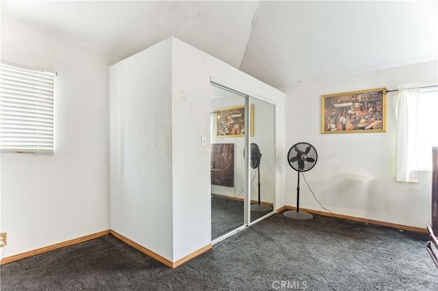 4519 9th Ave, Los Angeles, CA 90043 - unfurnished room featuring carpet and vaulted ceiling