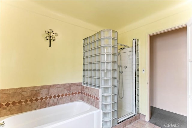 4519 9th Ave, Los Angeles, CA 90043 - bathroom featuring a bath and a shower stall