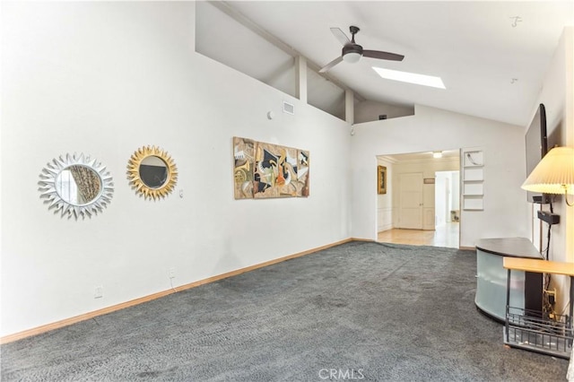 4519 9th Ave, Los Angeles, CA 90043 - unfurnished living room with a ceiling fan, carpet floors, high vaulted ceiling, and a skylight
