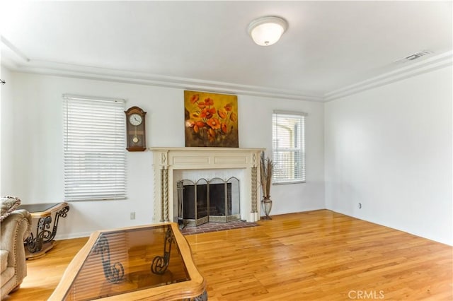 4519 9th Ave, Los Angeles, CA 90043 - living room with light wood-style flooring and a fireplace with flush hearth