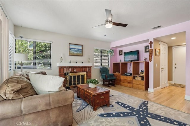 22024 Jeffers Ln, Saugus, CA 91350 - living room featuring a ceiling fan, plenty of natural light, and a fireplace