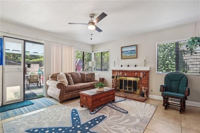 22024 Jeffers Ln, Saugus, CA 91350 - living area with ceiling fan, a fireplace, a textured ceiling, and light tile patterned flooring