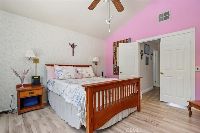22024 Jeffers Ln, Saugus, CA 91350 - bedroom with wood finished floors, wallpapered walls, high vaulted ceiling, and ceiling fan