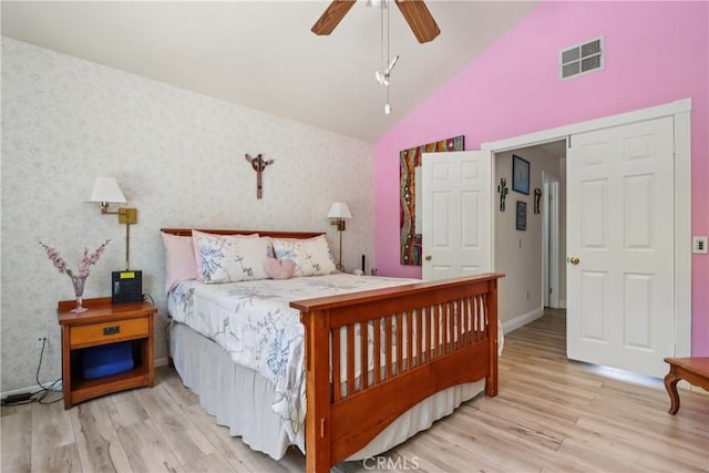 22024 Jeffers Ln, Saugus, CA 91350 - bedroom featuring wood finished floors, wallpapered walls, high vaulted ceiling, and a ceiling fan