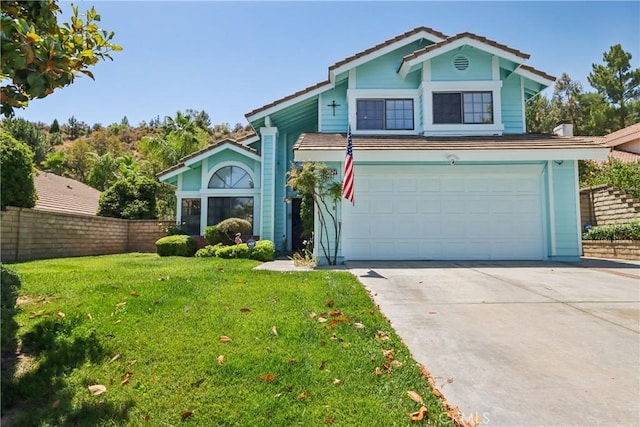 22024 Jeffers Ln, Saugus, CA 91350 - view of front of house featuring an attached garage, concrete driveway, and a tiled roof