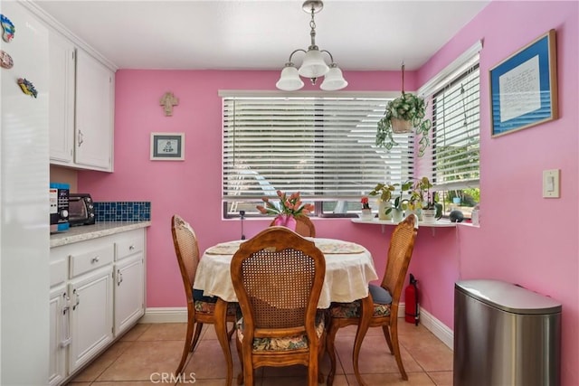 22024 Jeffers Ln, Saugus, CA 91350 - dining space featuring light tile patterned floors