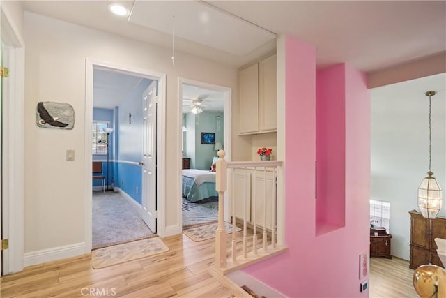 22024 Jeffers Ln, Saugus, CA 91350 - hallway featuring attic access, light wood finished floors, plenty of natural light, and recessed lighting
