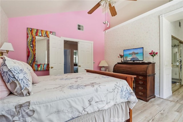 22024 Jeffers Ln, Saugus, CA 91350 - bedroom with wood finished floors, lofted ceiling, a ceiling fan, and connected bathroom