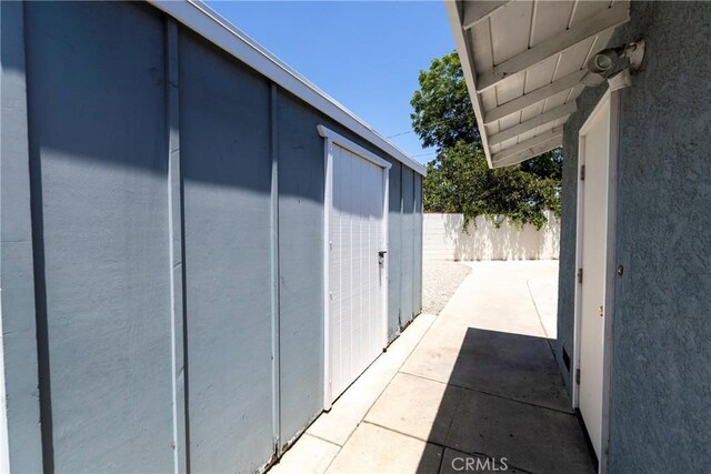 14913 San Ardo Dr, La Mirada, CA 90638 - view of patio with a storage unit