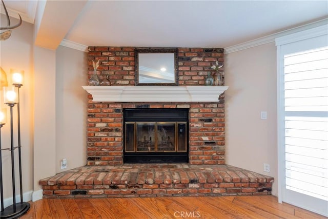 14913 San Ardo Dr, La Mirada, CA 90638 - detailed view of wood finished floors, a brick fireplace, and ornamental molding